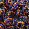 close up view of a pile of 20mm Orange, Purple and Black Striped Rhinestone AB Bubblegum Beads