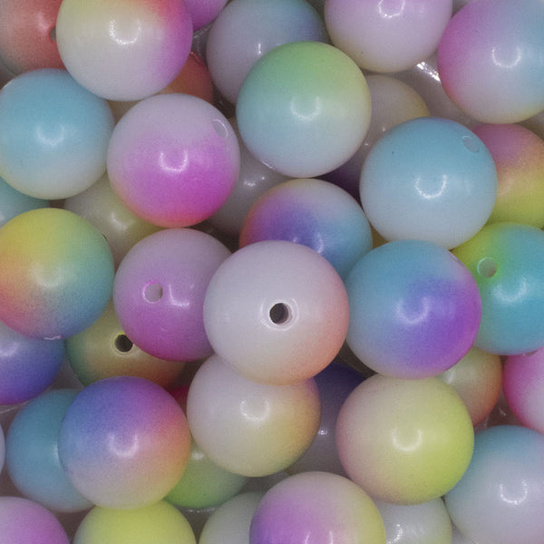 close up view of a pile of 20mm Pastel Mermaid Ombre Bubblegum Beads