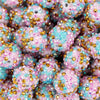 Close up image of a pile of 20mm Pink, Blue, Gold Confetti Rhinestone AB Bubblegum Beads
