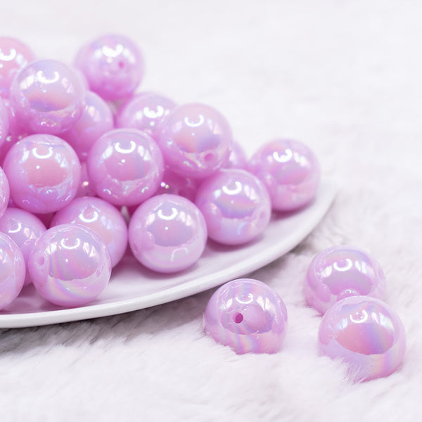 front view of a pile of front view of a pile of 20mm Pastel Purple Jelly AB Acrylic Chunky Bubblegum Beads