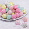 front view of a pile of 20mm Pastel Rhinestone AB Acrylic Bubblegum Bead Mix - 50 Count