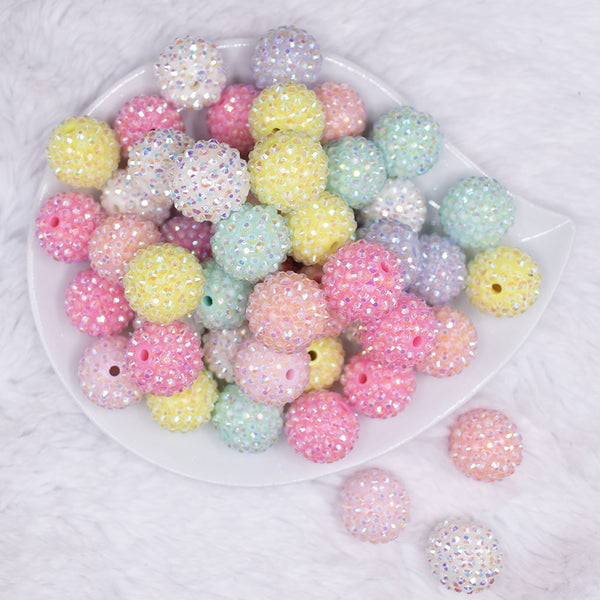 top view of a pile of 20mm Pastel Rhinestone AB Acrylic Bubblegum Bead Mix - 50 Count