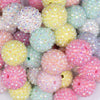 Close up view of a pile of 20mm Pastel Rhinestone AB Acrylic Bubblegum Bead Mix - 50 Count