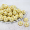 Front view of a pile of 20MM Pastel Yellow AB Solid Chunky Bubblegum Beads