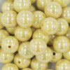 Close up view of a pile of 20MM Pastel Yellow AB Solid Chunky Bubblegum Beads