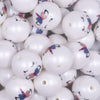 Close up view of a pile of 20mm Patriotic Sleeping Unicorn Print on Matte White Acrylic Bubblegum Beads