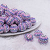 front view of a pile of 20mm Pink, Purple and Silver Striped Rhinestone AB Bubblegum Beads