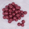 top view of a pile of 20mm Pink and Red Striped Rhinestone AB Bubblegum Beads