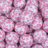 close up view of a pile of 20mm White and Pink Cow Print Bubblegum Beads