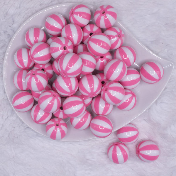 top view of a pile of 20mm Pink with White Stripe Beach Ball Acrylic Bubblegum Beads