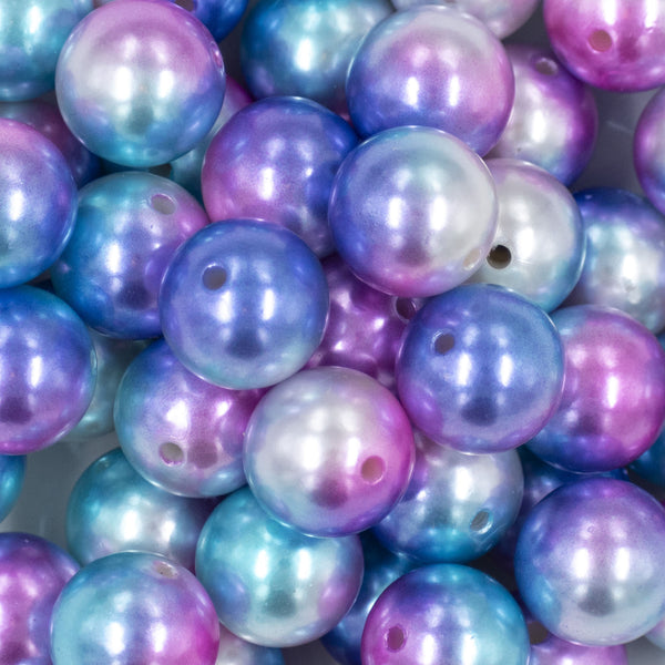Close up view of a pile of 20mm Pink, Blue & Purple Ombre Shimmer Faux Pearl Bubblegum Beads