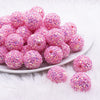 front view of a pile of 20mm Pink Sequin Confetti Bubblegum Beads
