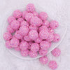 top view of a pile of 20mm Pink Sequin Confetti Bubblegum Beads
