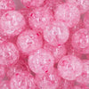 Close up view of a pile of 20mm Pink Crackle Bubblegum Beads