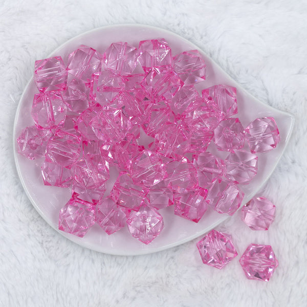 Top view of a pile of 20mm Pink Transparent Cube Faceted Pearl Bubblegum Beads