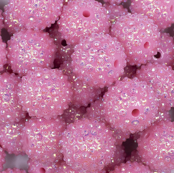 Close up view of a pile of 20mm Pink Flower Rhinestone Bubblegum Beads