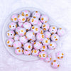 Top view of a pile of 20mm Pink & Gold Polka Dots Bubblegum Beads