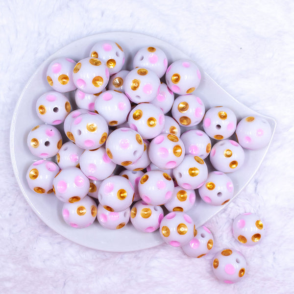 Top view of a pile of 20mm Pink & Gold Polka Dots Bubblegum Beads
