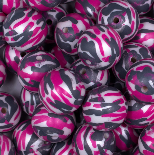 Close up view of a pile of 20mm Pink, Gray & White Camo Acrylic Bubblegum Beads