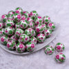 Front view of a pile of 20mm Pink & Green Hawaiian Print Flowers Bubblegum Beads