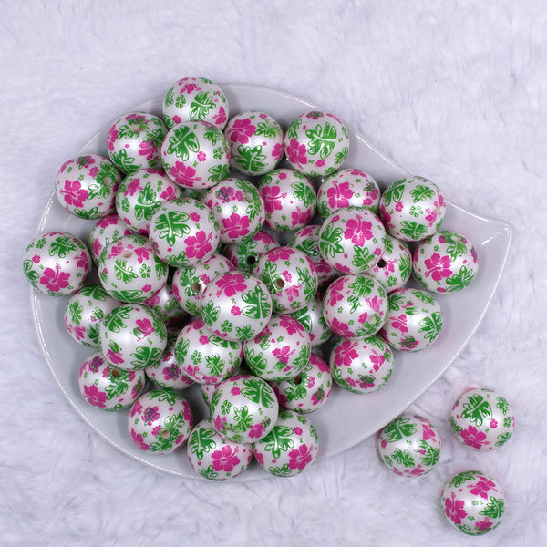 Top view of a pile of 20mm Pink & Green Hawaiian Print Flowers Bubblegum Beads