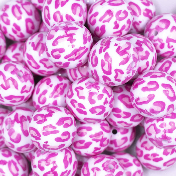 Close up view of a pile of 20mm Pink Leopard Animal Print Acrylic Bubblegum Beads