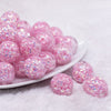 front view of a pile of 20mm Pink Majestic Confetti Bubblegum Beads