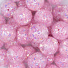 Close up view of a pile of 20mm Pink Majestic Confetti Bubblegum Beads