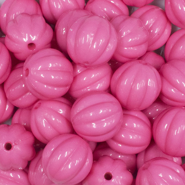 close up view of a pile of 20mm Pink Opaque Pumpkin Shaped Bubblegum Bead