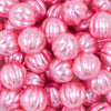 Close up view of a pile of 20mm Pink Pearl Pumpkin Shaped Bubblegum Bead