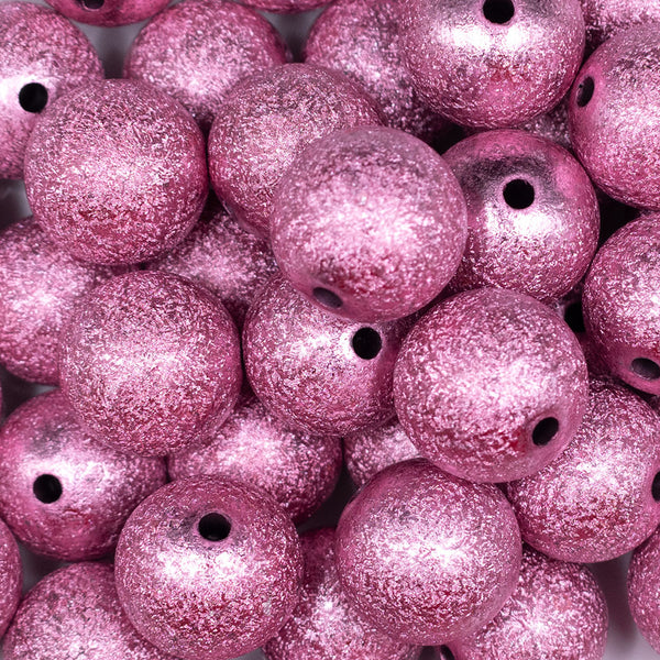 Close up view of a pile of 20mm Pink Stardust Chunky Bubblegum Beads
