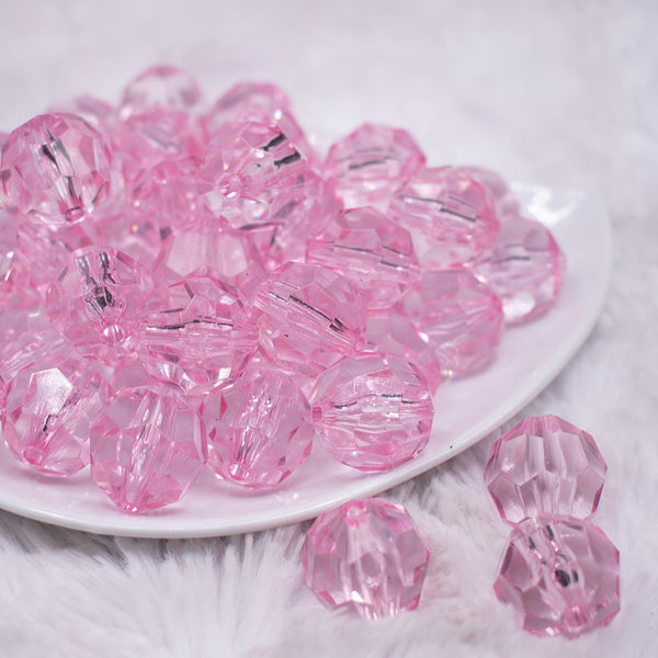 front view of a pile of 20mm Pink Transparent Faceted Bubblegum Beads