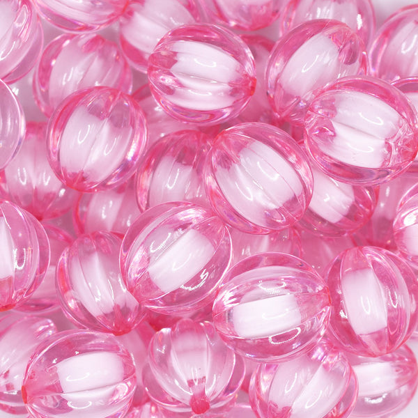 close up view of a pile of 20mm Pink Transparent Pumpkin Shaped Bubblegum Bead