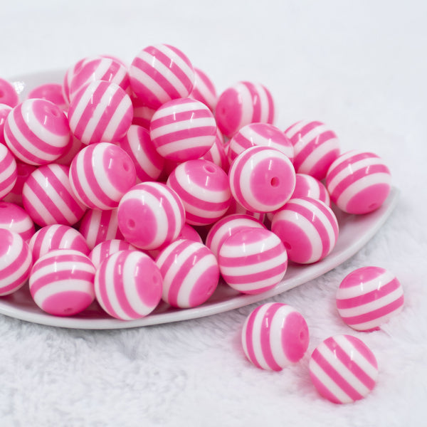 Front view of a pile of 20mm Pink with White Stripe Bubblegum Beads