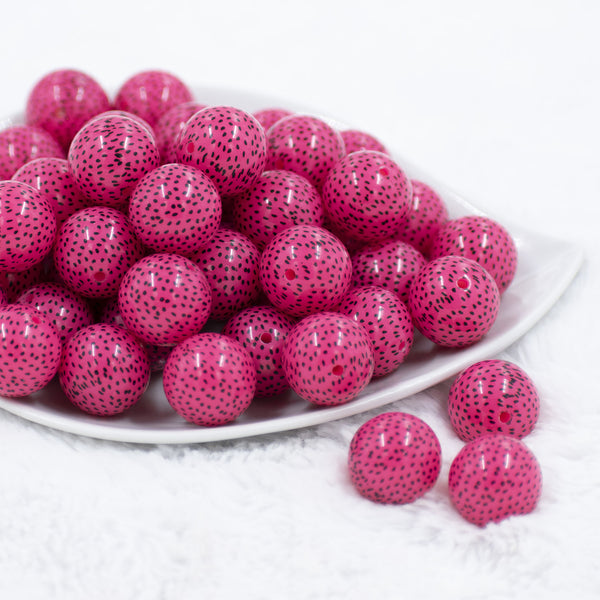 Front view of a pile of 20MM Seeds Print on Pink Chunky Acrylic Bubblegum Beads