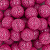 Close up view of a pile of 20MM Seeds Print on Pink Chunky Acrylic Bubblegum Beads