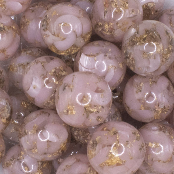close up view of a pile of 20mm Pink and Gold Flake Acrylic Chunky Bubblegum Beads