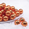 front view of a pile of 20MM Jack O Lantern Pumpkin Face Halloween pearl Bubblegum Beads