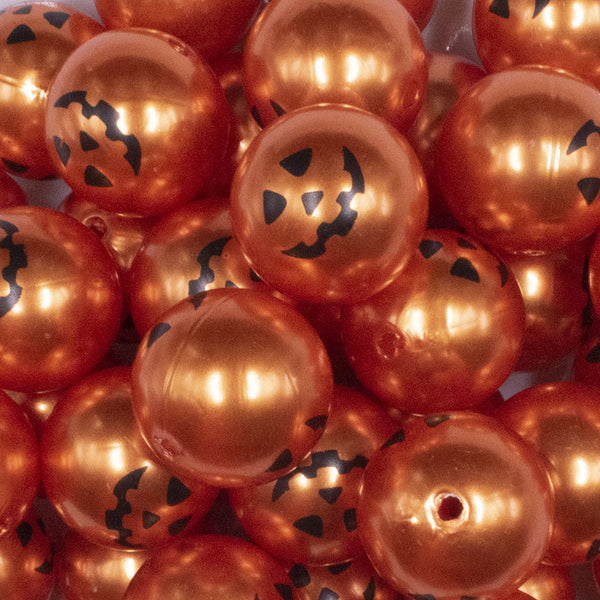 close up view of a pile of 20MM Jack O Lantern Pumpkin Face Halloween pearl Bubblegum Beads