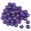 top view of a pile of 20mm Purple with Black Stripe Beach Ball Bubblegum Beads