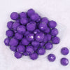 Top view of a pile of 20mm Purple Faceted Opaque Bubblegum Beads