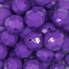 Close up view of a pile of 20mm Purple Faceted Opaque Bubblegum Beads