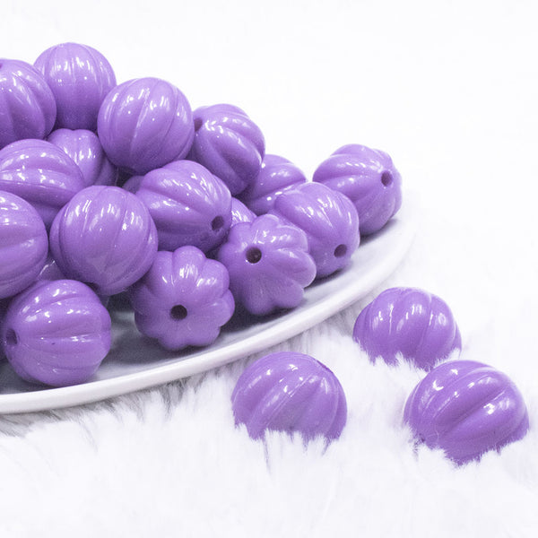 front view of a pile of 20mm Purple Opaque Pumpkin Shaped Bubblegum Bead