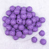 top view of a pile of 20mm Purple Opaque Pumpkin Shaped Bubblegum Bead