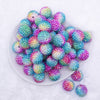 Top view of a pile of 20mm Rainbow Confetti AB Rhinestone Bubblegum Beads 
