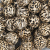 Close up view of a pile of 20mm Realistic Leopard Animal Print Acrylic Bubblegum Beads