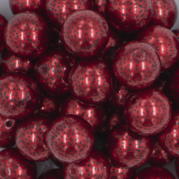 Close up view of a pile of 20MM Seeds Print on Red pearl Chunky Acrylic Bubblegum Beads