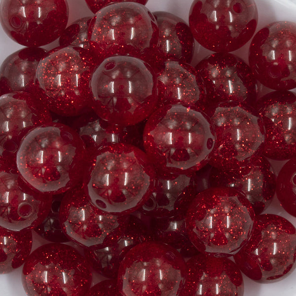 Close up view of a pile of 20mm Red Glitter Sparkle Chunky Acrylic Bubblegum Beads