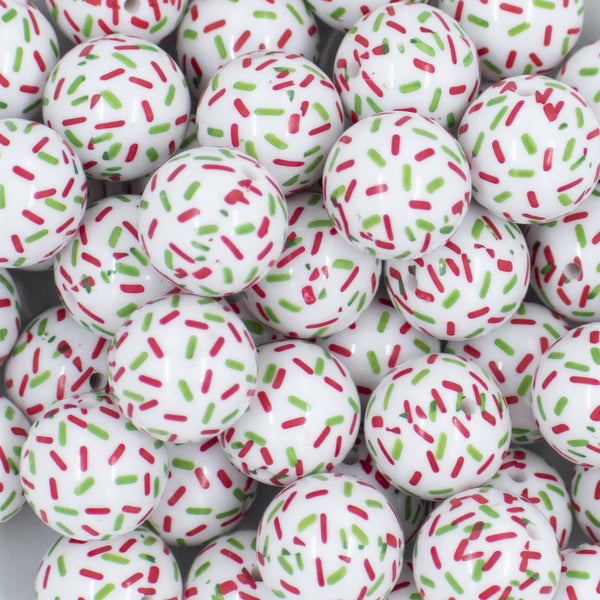 Close up view of a pile of 20mm Red & Green Sprinkles Chunky Acrylic Bubblegum Beads