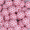 close up view of a pile of 20mm Red Hearts on Pink Acrylic Bubblegum Beads